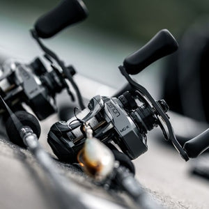 Close-up of an Abu Garcia Zenon Baitcasting fishing reel with a blurred background