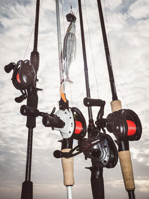 Abu Garcia baitcasting fishing rods with Abu Garcia MAX reels against a cloudy sky